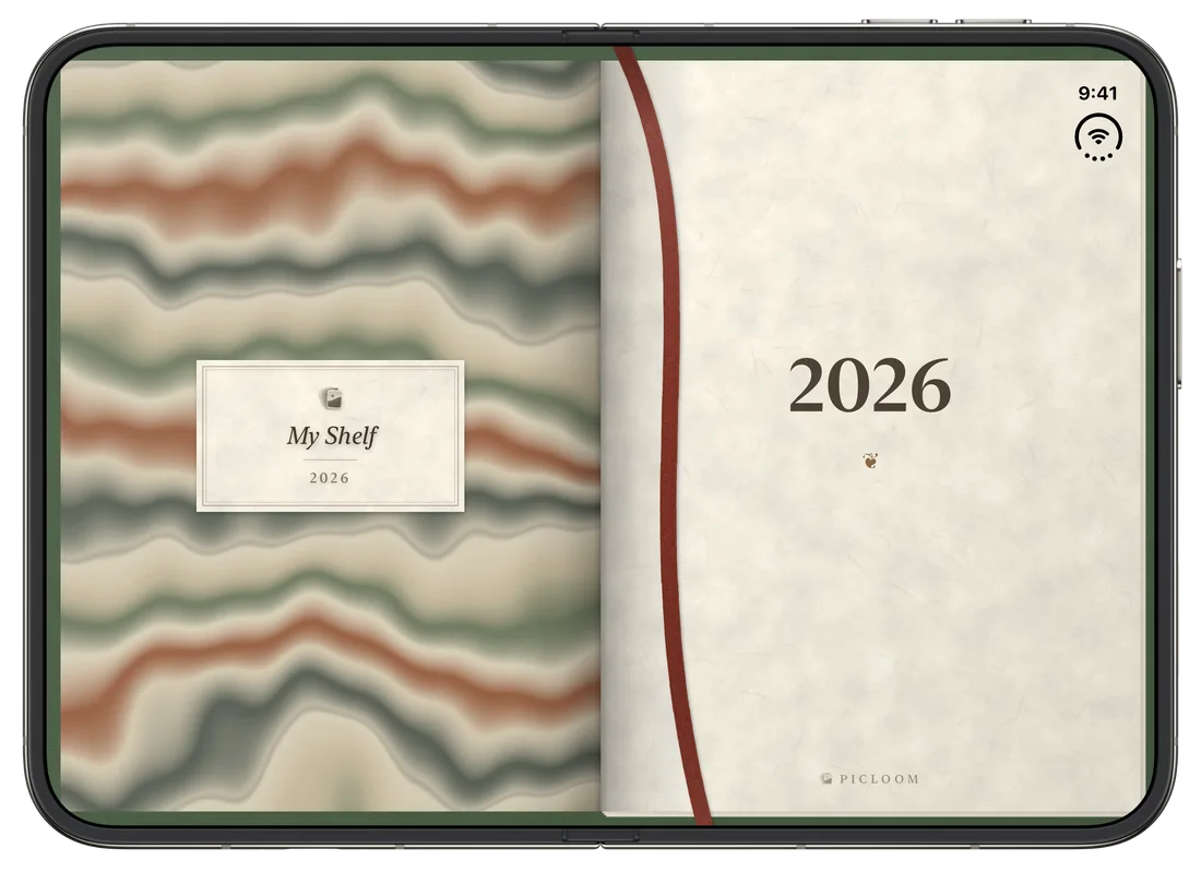iPhone Duo open: the inner screen shows the yearbook's opening spread